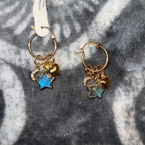 Super Cute Hoop Earrings with dangling charms.